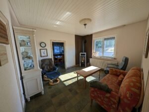big_06_Hauptwohnbereich_EG_Wohnzimmer_Kamin